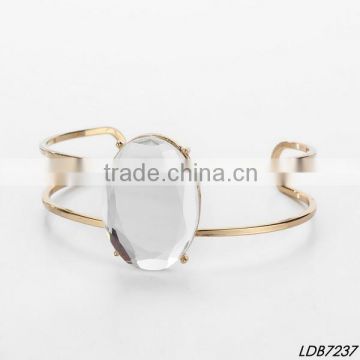 Tangential big oval clear crystal quartz gold cuff bangle