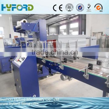 Shrink wrapping machine for bottle