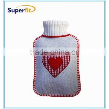 hot water bag + red heart knitted cover