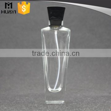 empty perfume bottle glass with black cap