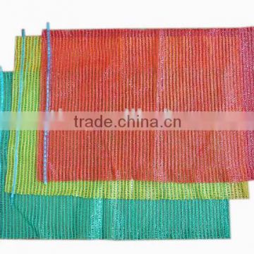 Red and green fruit netting bags for packing vegetable