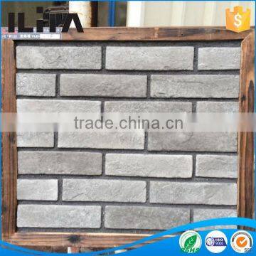 Light grey decorative wall veneer stone silicon mould rustic stone wall cladding latest building materials