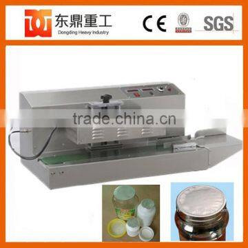 Automatic Aluminum Foil Cap Sealing Machine With Best Price photo-4