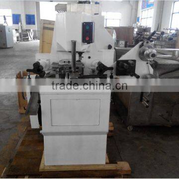 Knurling /covering Machine for Round Chocolate Embossing Machine photo-3