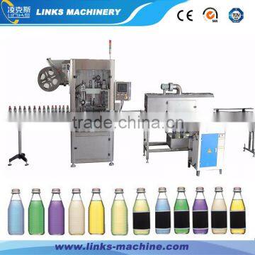 Plastic bottle sleeve labeling machine