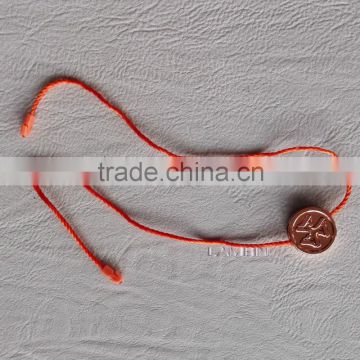 Gold string seal tag for working wear