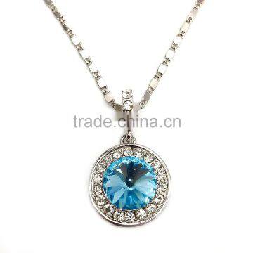 smaller crystals adorning necklace with the silver pendant