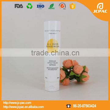 natural sunscreen cream cosmetic plastic packaging white tube with flip-top cap