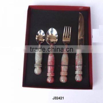 Steel cutlery set mirror polished with round resin handle in green colour