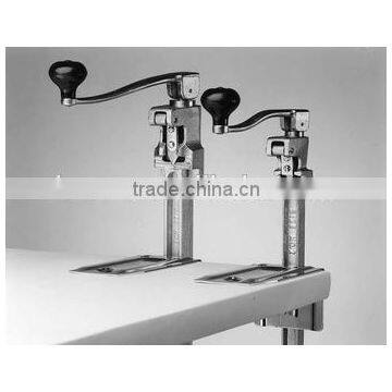 Cast Iron Can Opener on Table Use photo-2