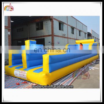 High Quality Inflatable Sports Games Runaway Track Running Bungee Games For Sale