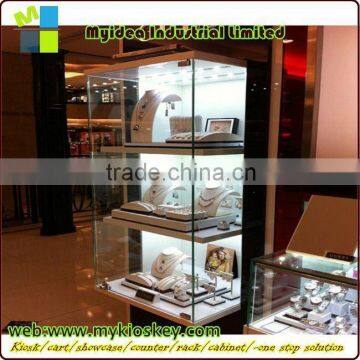 Marvelous retail store design high end wood and glass jewelry counter