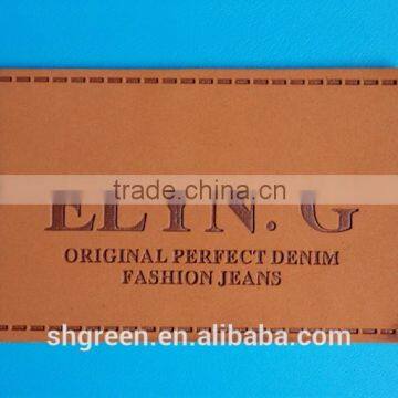 Fashion jeans brand name faux leather patch