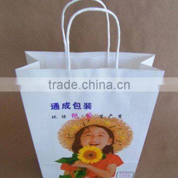 white kraft paper bag with cotton handle