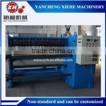 Abrasive cloth paper roll slitter machine