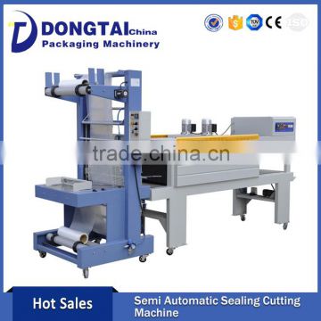 Beverage bottle shrinking packaging machine