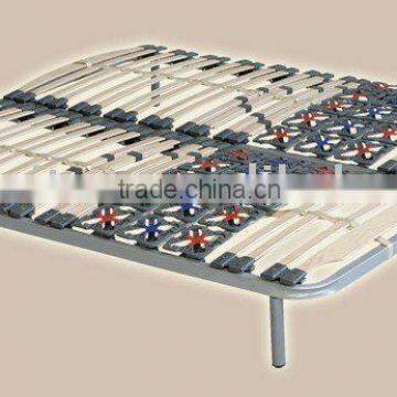 wood slatted steel bedstead with plastic flowers