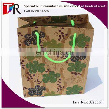 Yiwu market customize cheap small paper gift bags with handles