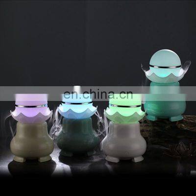 New Arrival 500ml Ultrasonic Aroma Essential Oil Diffuser With 7 Color Lights photo-5