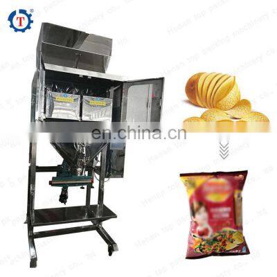 Factory supplier Automatic Electronic Scale Packaging Machine for sesame salt tea leaves with sealing machine from Amy