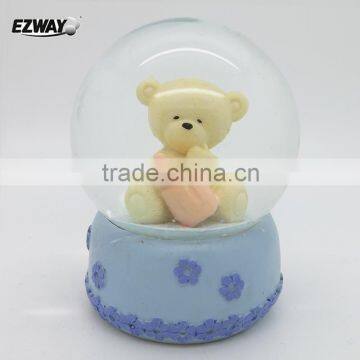 45# Unique design polyresin cheap customed snow water globe