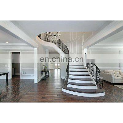 Wood step close riser metal railing curved staircases