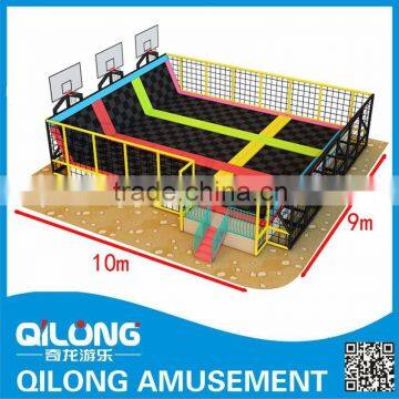 Big trampoline park with basketball hoop