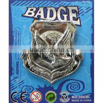 flying Eagle plastic badge toy silver color