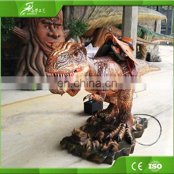 Theme park amusement kiddie rides on dinosaur