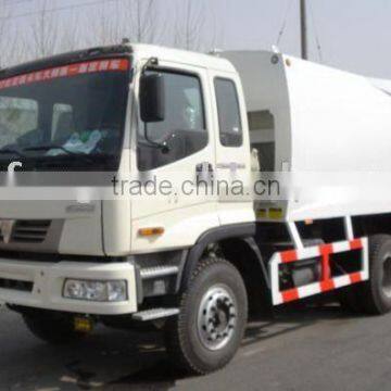 refuse compactor/garbage truck