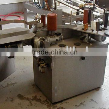 label sticking machine