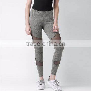 Women Wearing Grey Melange Net Panelled Tights Seamless Yoga Pants