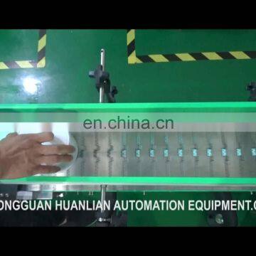 HL Automatic Sticker Labeling Machine for Fire Extinguisher , Round Positioning Labeling Equipment