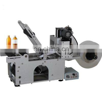 high quality semi automatic horizontal cold glue round bottle labeller sticker labeling machine