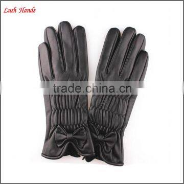 2015 lady's fashion black sheep leather gloves with bow