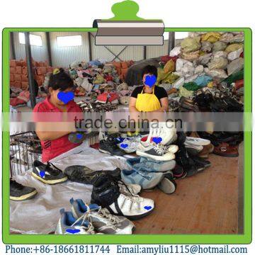 Sorting used shoes into 25kg sack