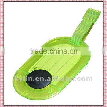 Plastic oval withdrawing luggage tag with belt