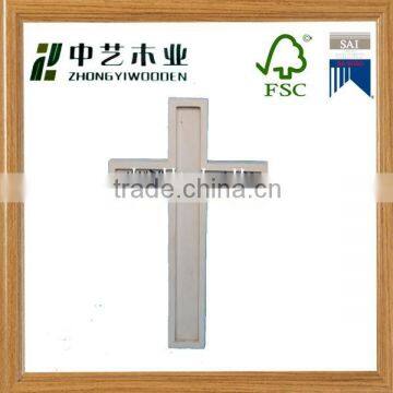 wooden cross decoration with different carving design