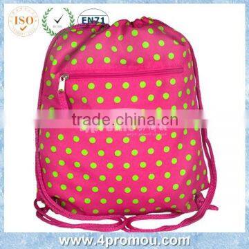 Drawstring backpack pink with green polka dots