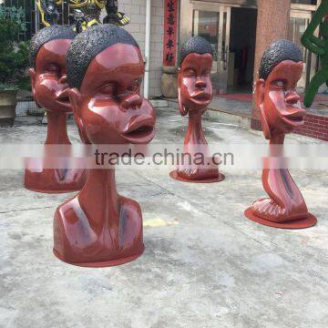 Playground park art cartoon head sculpture