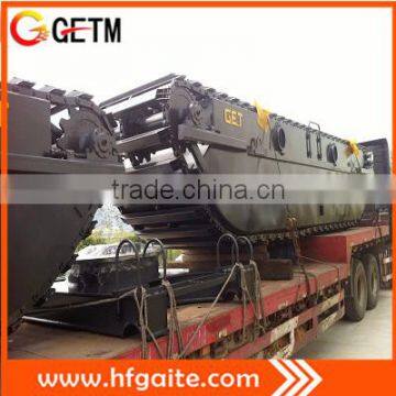 Dredging excavator for shoreline and swamps