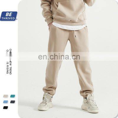 Wholesale customization Men's trousers Autumn and winter leisure Loose Solid color Plush thick drawstring Western style