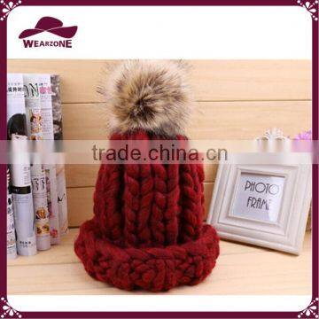 Acrylic thick needle knitted slouchy beanie with fur pom