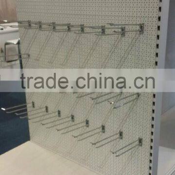 supermarkets shelves with metal pegboard hooks