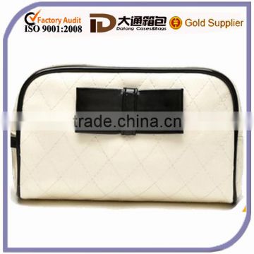 Dazzling PVC zipper closure cosmetic bag with black trim and decorations