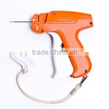 Portable tag gun for garment label