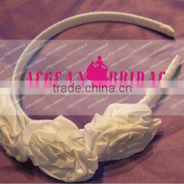 Style HA001 bride using handmade flower ivory head band