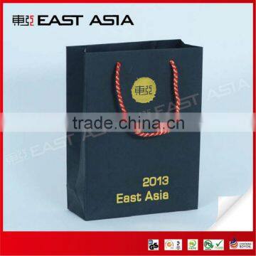 gold color rope shopping paper bag