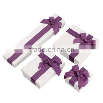 White color paperboard jewelry box with bow