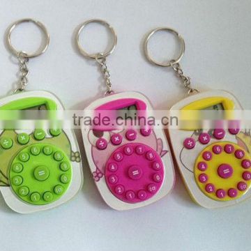 Mini plastic pocket calculator with keyring